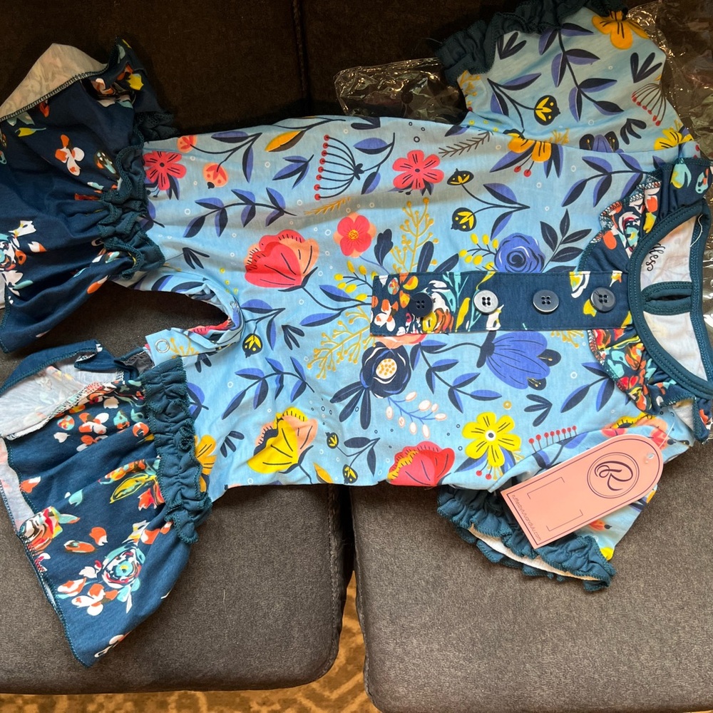 Indigo Baby Romper with Blue and Yellow Floral Design